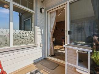 Step outside onto this charming patio, perfect for enjoying your morning coffee or evening relaxation.