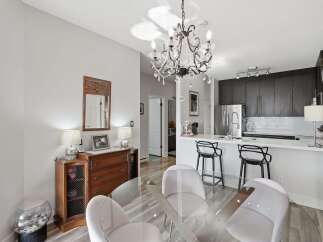 Experience modern living in this stunning condo featuring an open-concept layout perfect for entertaining.