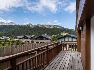 Experience breathtaking mountain views from this charming balcony, perfect for enjoying your morning coffee or evening relaxation.