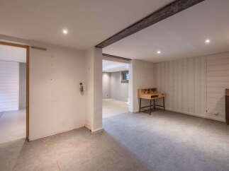 Discover the potential of this unfinished basement, offering a blank canvas for your dream living space.