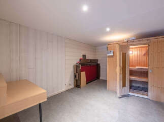 Discover this unique recreational space featuring a private sauna, perfect for relaxation and rejuvenation.
