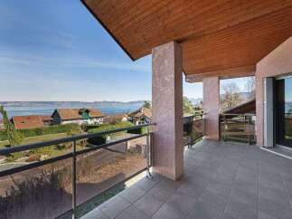 Enjoy breathtaking lake and mountain views from this spacious balcony, perfect for outdoor entertaining or quiet relaxation.