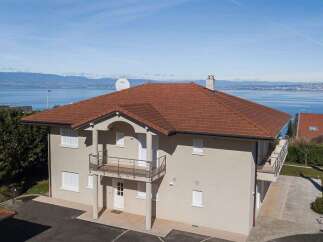 Experience breathtaking lake and mountain views from this stunning property.