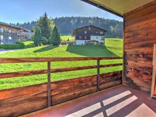 Enjoy breathtaking mountain views from this charming balcony, perfect for your morning coffee or evening relaxation.
