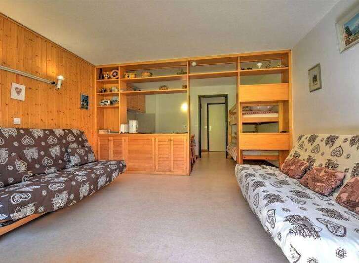 This cozy studio apartment features a versatile living space with two comfortable sofa beds, perfect for accommodating guests.