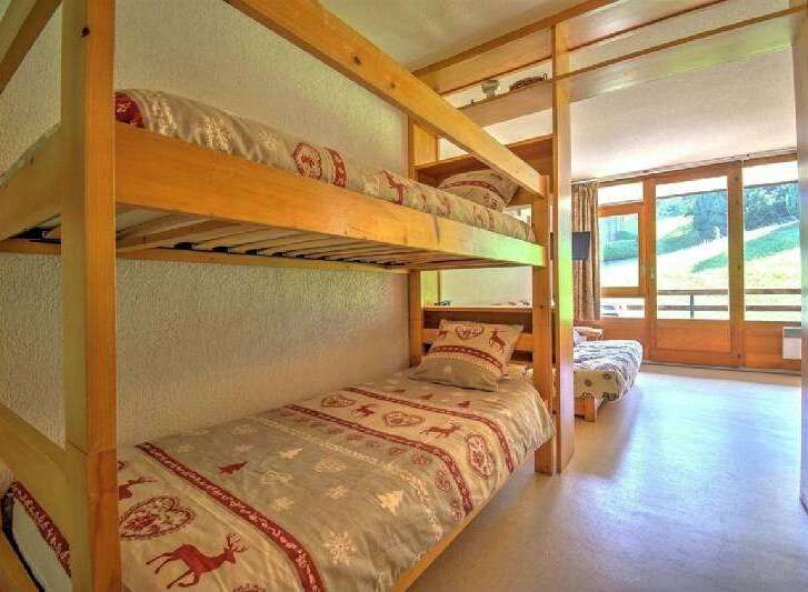 This charming property features a cozy bunk bed setup, perfect for families or groups.