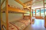 This charming property features a cozy bunk bed setup, perfect for families or groups.