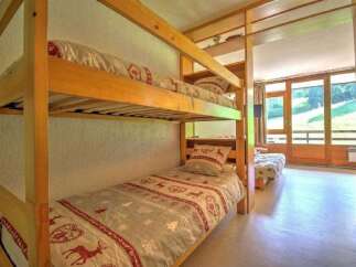 This charming property features a cozy bunk bed setup, perfect for families or groups.