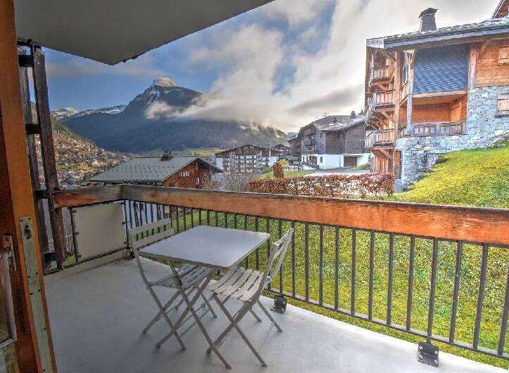 Enjoy breathtaking mountain views from this charming balcony, perfect for your morning coffee or evening relaxation.