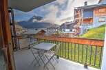 Enjoy breathtaking mountain views from this charming balcony, perfect for your morning coffee or evening relaxation.