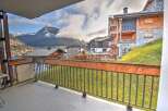 Experience breathtaking mountain views from this charming balcony, perfect for enjoying your morning coffee or evening relaxation.