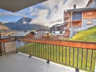 Experience breathtaking mountain views from this charming balcony, perfect for enjoying your morning coffee or evening relaxation.