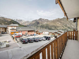 Experience the charm of mountain living with this picturesque property offering stunning views of snow-capped peaks.
