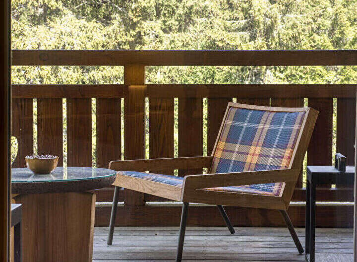 Enjoy the serene outdoors from this charming balcony, perfect for a morning coffee or evening relaxation.