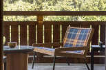 Enjoy the serene outdoors from this charming balcony, perfect for a morning coffee or evening relaxation.