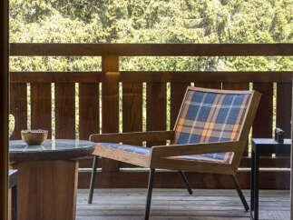 Enjoy the serene outdoors from this charming balcony, perfect for a morning coffee or evening relaxation.