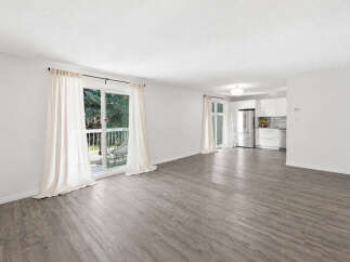 Step into this bright and airy living space featuring a modern open-concept layout.