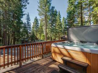 Relax and unwind in this charming cabin getaway, complete with a luxurious hot tub perfect for soaking under the stars.