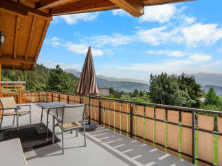 Enjoy breathtaking mountain views from this charming balcony, perfect for morning coffee or evening relaxation.