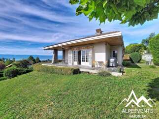 Discover this charming property with stunning lake and mountain views, perfect for those seeking tranquility and natural beauty.