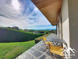 Enjoy breathtaking views from this charming property's expansive terrace, perfect for al fresco dining or simply relaxing.