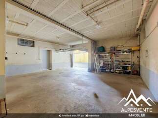 Discover this spacious garage, perfect for parking multiple vehicles or for ample storage.