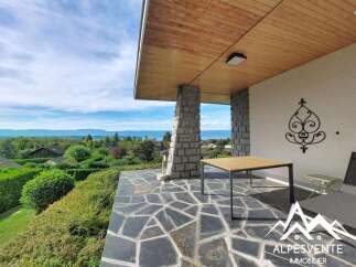 Enjoy breathtaking panoramic views from this stunning property's expansive terrace, perfect for al fresco dining or simply soaking in the scenery.