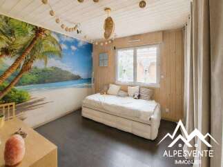 Escape to paradise in this charming bedroom featuring a stunning tropical beach mural that brings the vacation vibes indoors.