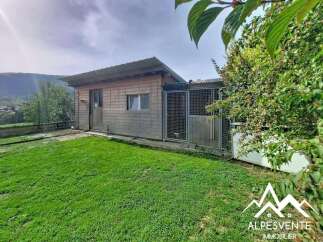 Discover this charming wooden structure, perfect for storage or as a versatile outbuilding.