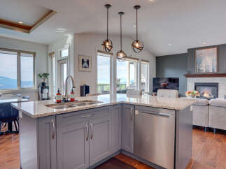 Experience breathtaking mountain and valley views from this stunning open-concept living space.