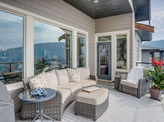 Enjoy breathtaking mountain views from this expansive covered patio, perfect for year-round entertaining.