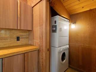 Discover the convenience of this stacked washer and dryer unit, perfect for maximizing space in your laundry area.