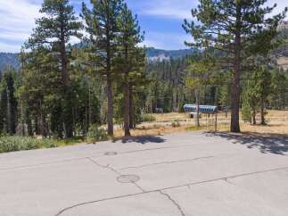 Discover this stunning property nestled amidst a picturesque mountain landscape, perfect for outdoor enthusiasts.