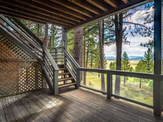 Enjoy breathtaking mountain views from this expansive deck, perfect for entertaining or quiet relaxation.