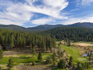 Experience luxury living nestled amidst a pristine pine forest and a championship golf course.