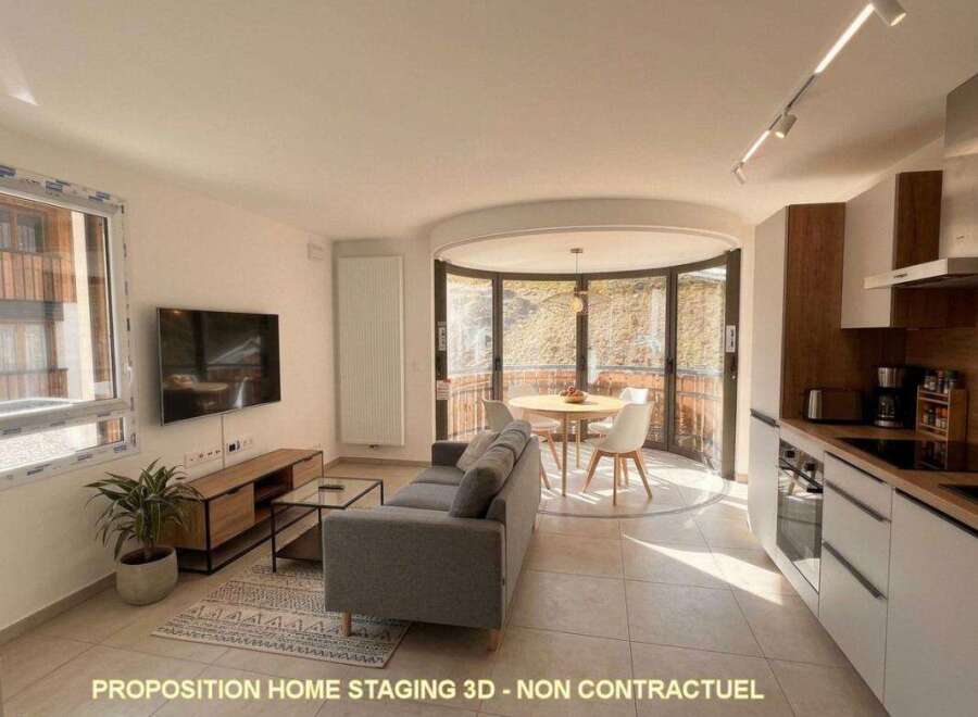 Experience modern living in this beautifully staged apartment, featuring a spacious open-plan living and dining area perfect for entertaining.