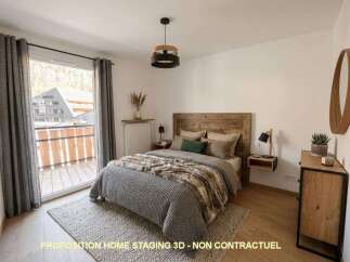 Experience cozy mountain living in this charming bedroom, featuring a rustic wooden headboard and plush bedding.