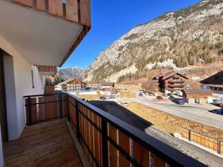 Experience breathtaking mountain views from this stunning balcony, perfect for enjoying your morning coffee or evening relaxation.