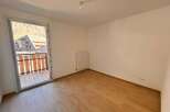 Discover this bright and airy room featuring a large glass door that opens to a charming balcony with scenic views.