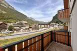 Experience breathtaking mountain views from this stunning balcony, perfect for enjoying your morning coffee or evening relaxation.