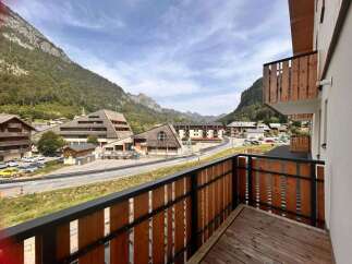 Experience breathtaking mountain views from this stunning balcony, perfect for enjoying your morning coffee or evening relaxation.