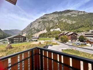 Experience breathtaking mountain views from this stunning property, nestled in a picturesque alpine village.