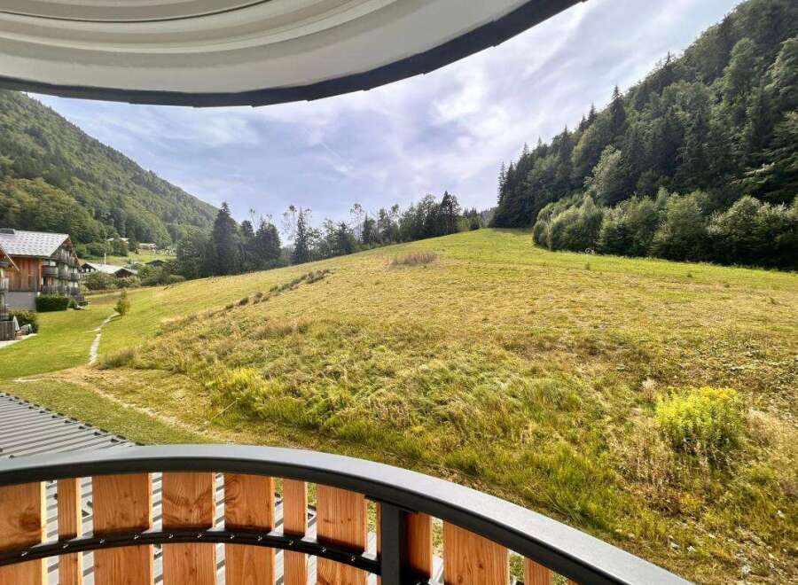 Experience breathtaking mountain views from this stunning property, nestled amidst lush green hills and dense forests.