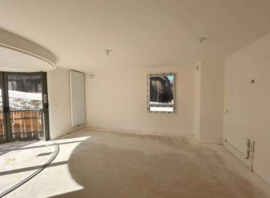 This unfinished interior space offers a blank canvas for your dream home.
