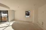 This unfinished interior space offers a blank canvas for your dream home.