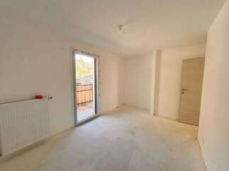 Discover this unfinished room, perfect for customization.