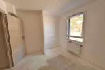 Discover this unfinished room, perfect for customization.