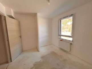 Discover this unfinished room, perfect for customization.