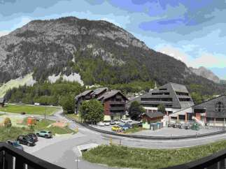 Discover this charming property nestled in a picturesque mountain village, offering breathtaking views of the surrounding peaks and lush greenery.