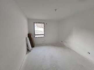 This unfinished room offers a blank canvas for your dream home.